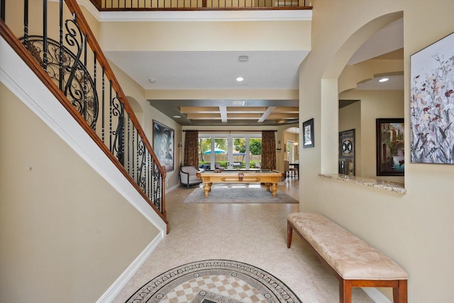 entryway with coffered ceiling, billiards, baseboards, stairway, and tile patterned floors