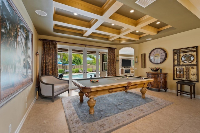 playroom with visible vents, arched walkways, baseboards, and french doors