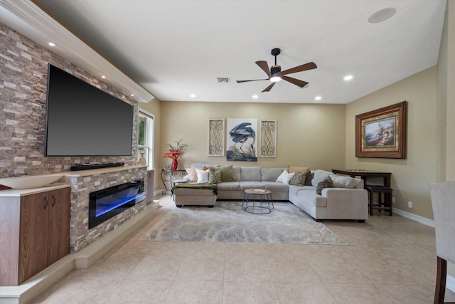 living room with recessed lighting, a large fireplace, visible vents, baseboards, and a ceiling fan