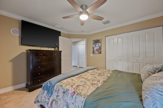 bedroom with light colored carpet, visible vents, baseboards, a closet, and crown molding