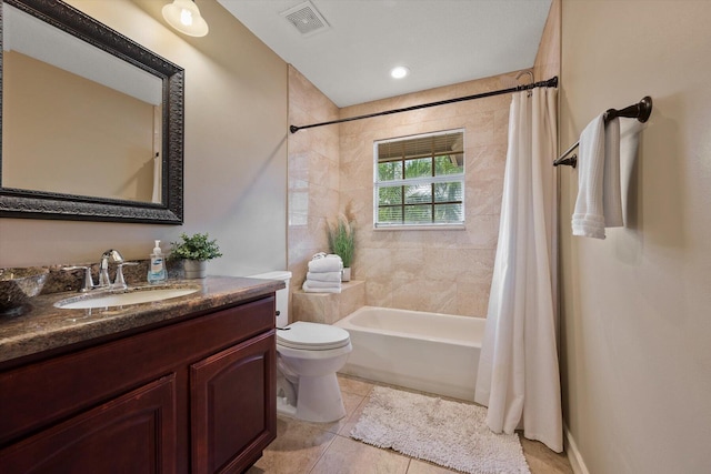 bathroom with visible vents, toilet, tile patterned floors, shower / bathtub combination with curtain, and vanity