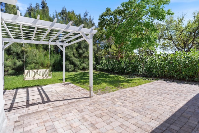 view of patio / terrace with fence and a pergola