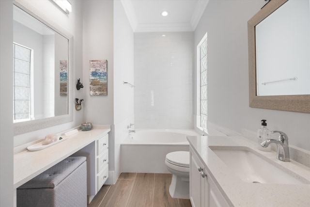 full bathroom featuring toilet, wood finished floors, recessed lighting, crown molding, and vanity