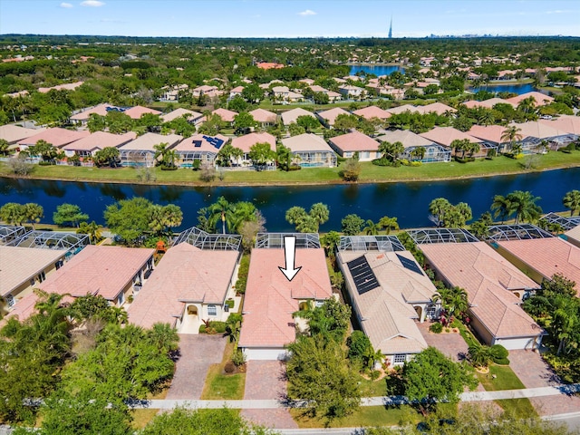 birds eye view of property featuring a residential view and a water view