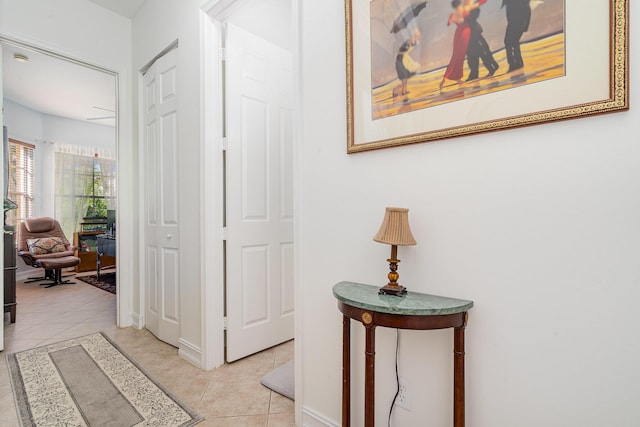 hall with light tile patterned flooring