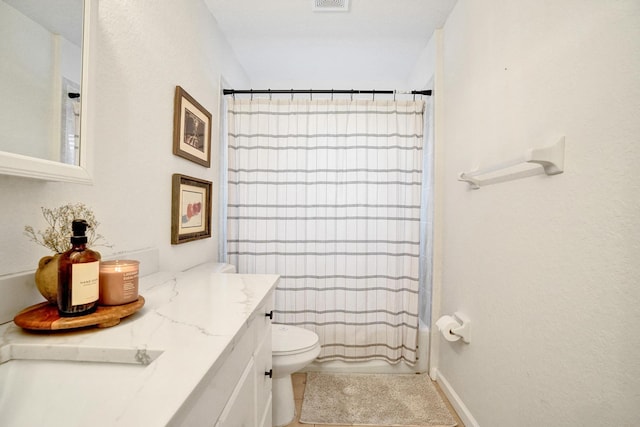 full bathroom with vanity, shower / tub combo, toilet, and visible vents