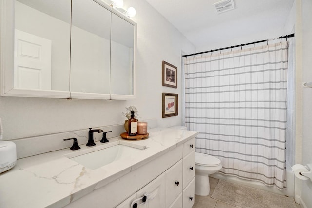 bathroom with visible vents, toilet, shower / bath combo, tile patterned floors, and vanity