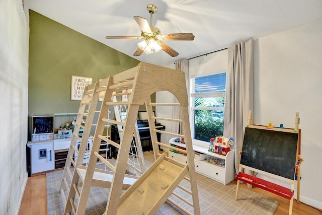 bedroom with ceiling fan and wood finished floors