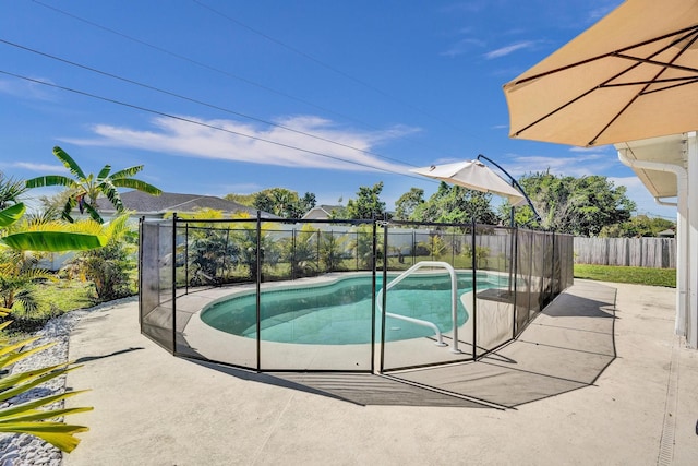 view of pool featuring a patio area, a fenced in pool, and a fenced backyard