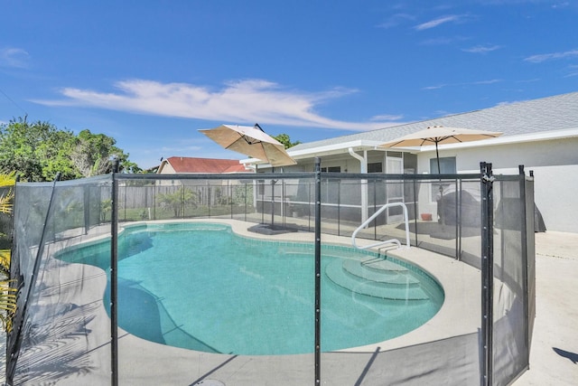 view of pool featuring a fenced in pool and fence