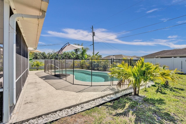 view of swimming pool featuring a patio area, a fenced backyard, and a fenced in pool