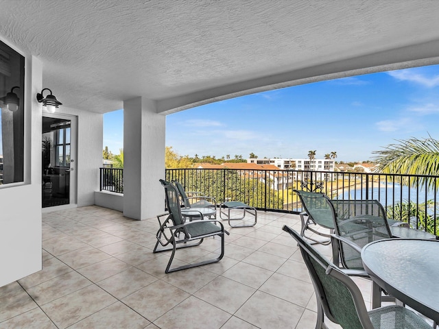 view of patio featuring outdoor dining area