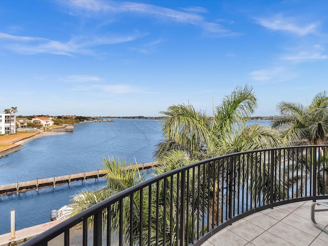 balcony featuring a water view