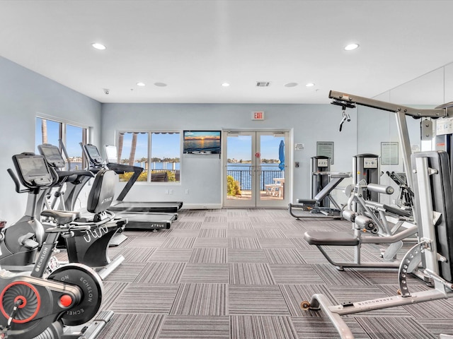 gym featuring visible vents, recessed lighting, french doors, carpet floors, and baseboards