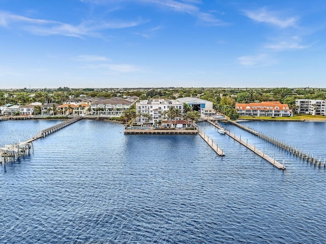 drone / aerial view featuring a water view and a residential view