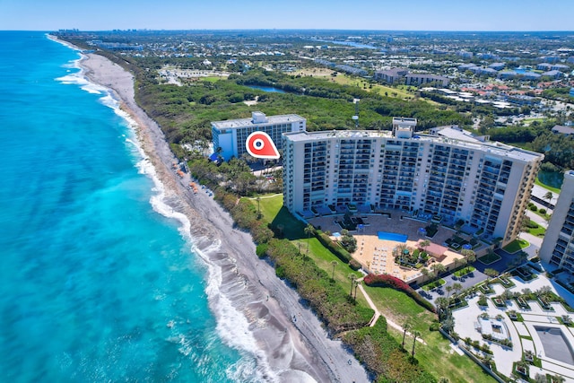 aerial view featuring a water view and a beach view