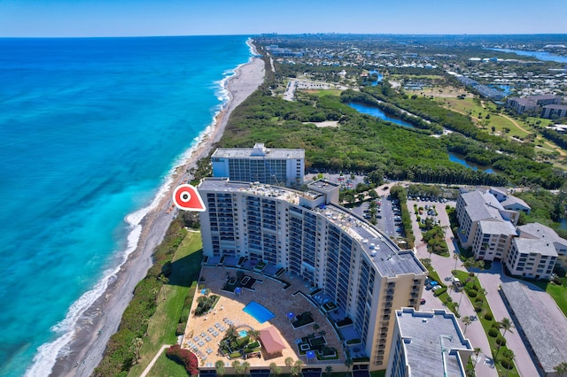 aerial view featuring a water view and a view of the beach