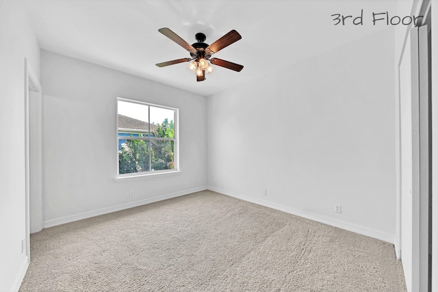 unfurnished room featuring baseboards, ceiling fan, and carpet flooring