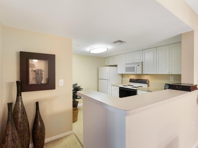 520 SE 5th Ave Unit 2405, Fort Lauderdale, FL 33301 - kitchen featuring light colored carpet, light countertops, a peninsula, white appliances, and visible vents