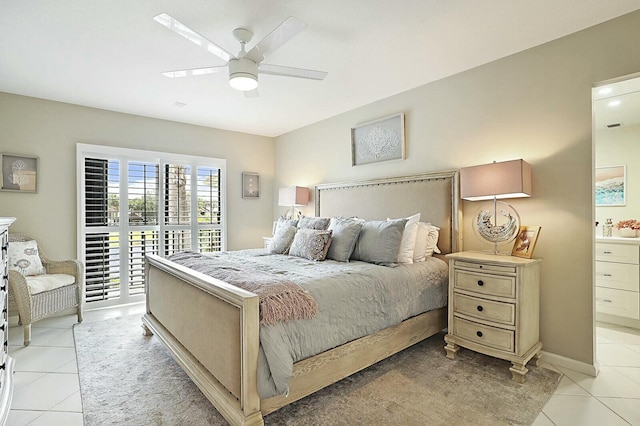 bedroom featuring light tile patterned floors, ceiling fan, and baseboards