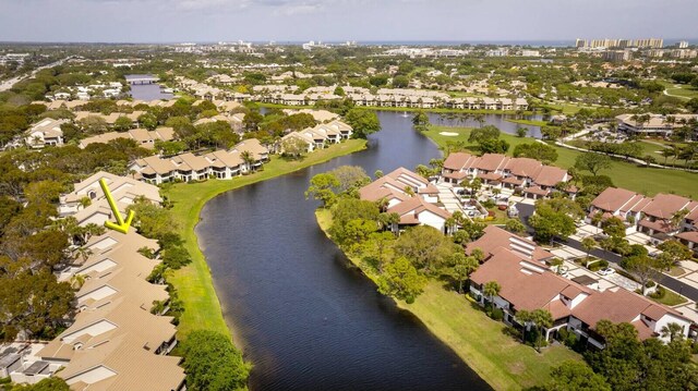 aerial view with a water view and a residential view