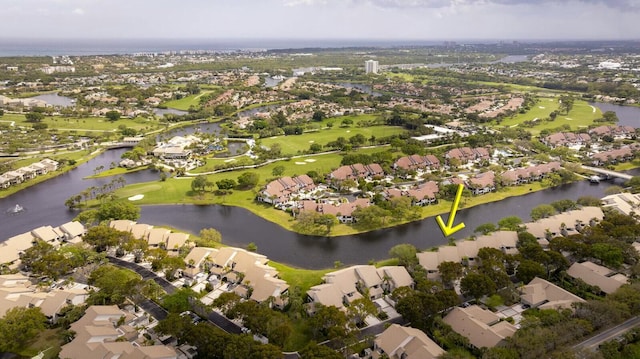 birds eye view of property featuring a residential view and a water view