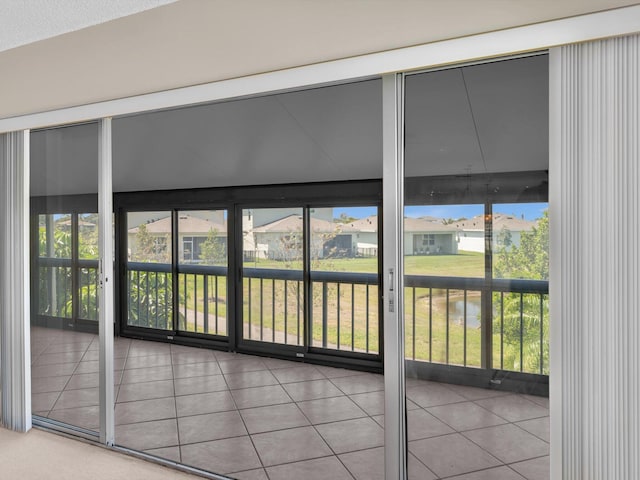 unfurnished sunroom featuring a wealth of natural light