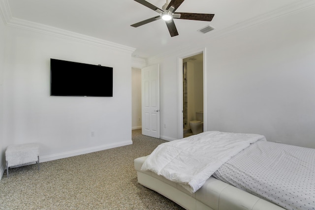 carpeted bedroom featuring ceiling fan, ensuite bathroom, visible vents, baseboards, and ornamental molding