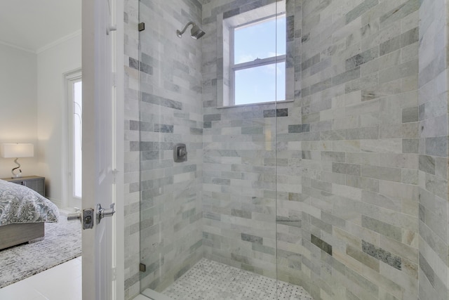 full bathroom featuring ornamental molding and a stall shower