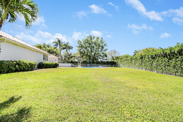 view of yard featuring fence