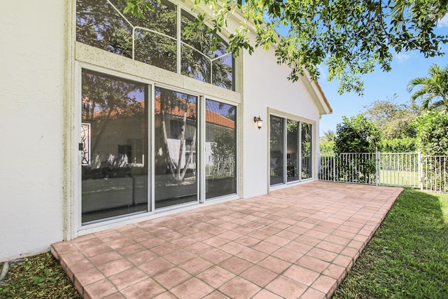 view of patio / terrace featuring fence