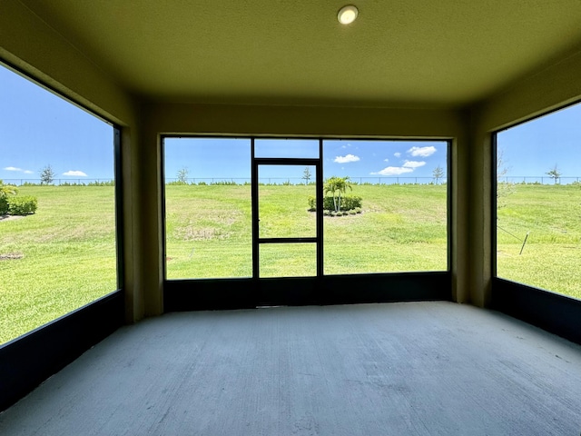 unfurnished sunroom with plenty of natural light