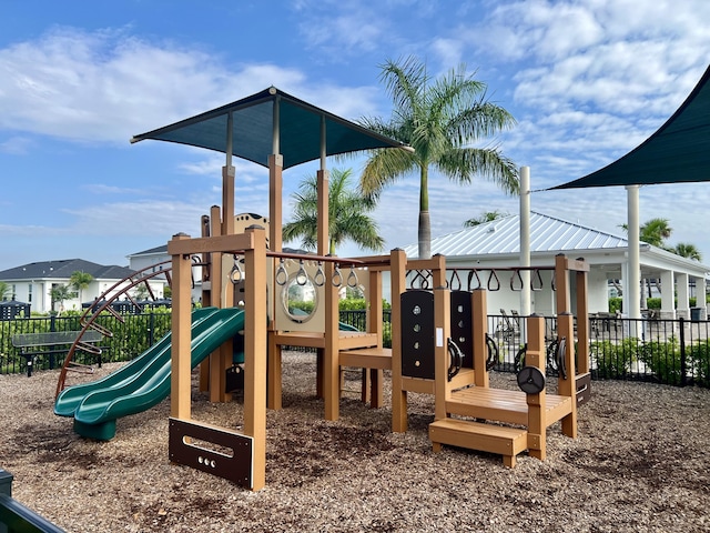 community play area featuring fence