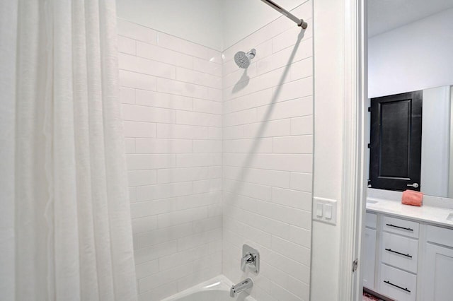 full bath featuring vanity and shower / tub combo