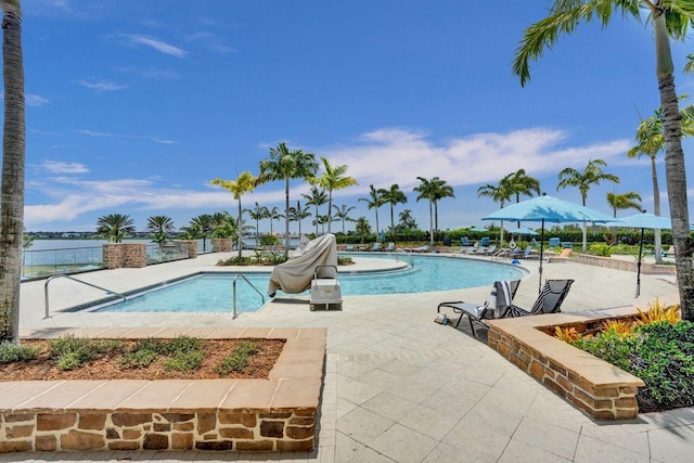 pool featuring a patio area