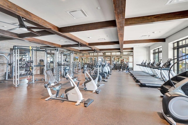 gym with visible vents and a ceiling fan