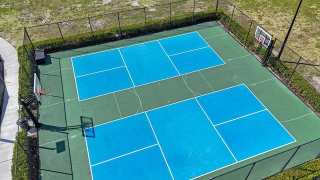 view of sport court with community basketball court and fence