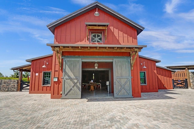 view of barn featuring an exterior structure