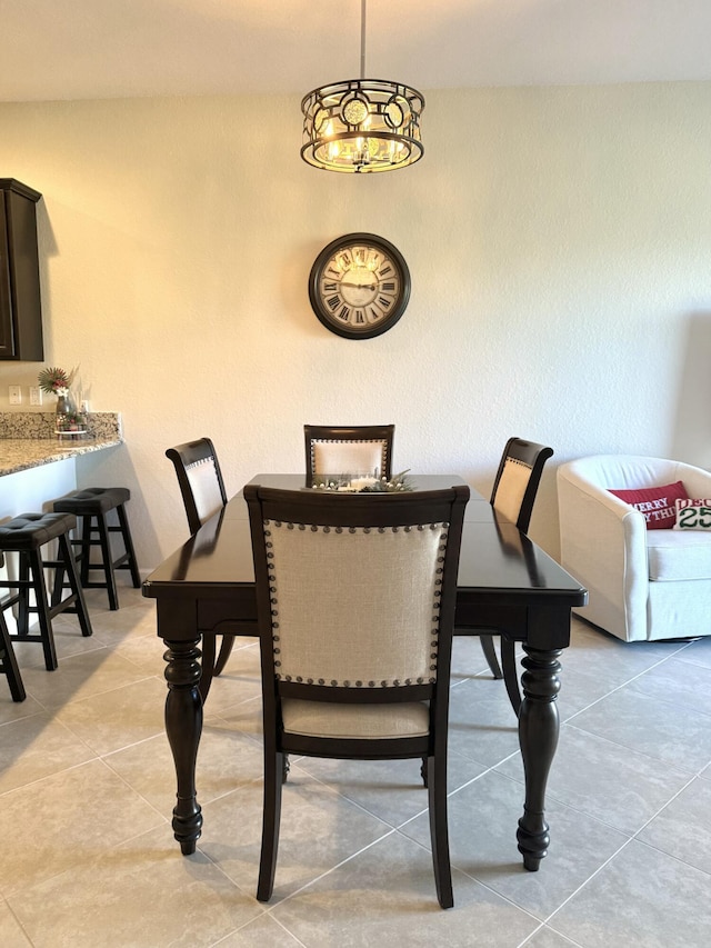 dining area with light tile patterned flooring