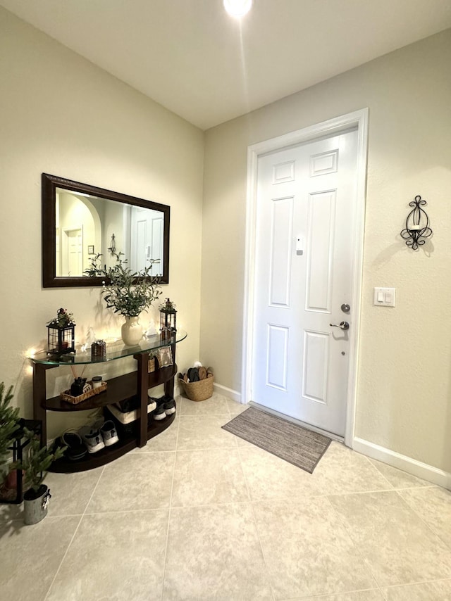 entrance foyer featuring baseboards