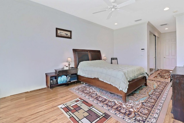 bedroom with visible vents, recessed lighting, and light wood-type flooring