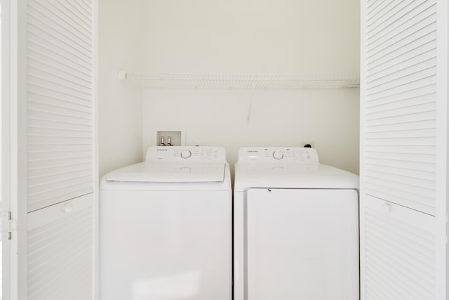 laundry area featuring laundry area and separate washer and dryer