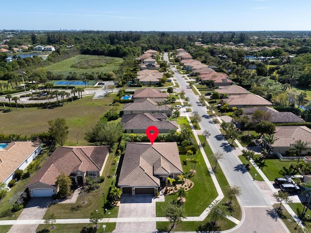 aerial view featuring a residential view and a water view