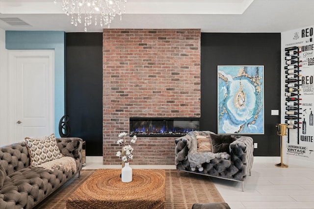 living area with a fireplace, visible vents, and baseboards