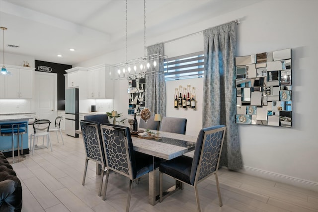 dining room featuring recessed lighting, light wood-type flooring, visible vents, and baseboards