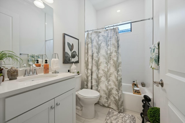 bathroom featuring vanity, toilet, and shower / bathtub combination with curtain