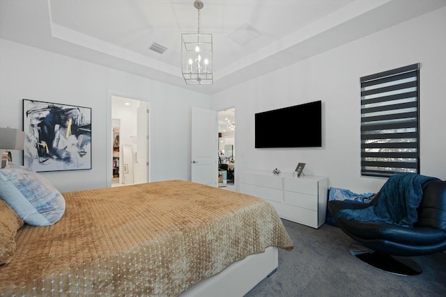 carpeted bedroom featuring a raised ceiling, visible vents, and a notable chandelier