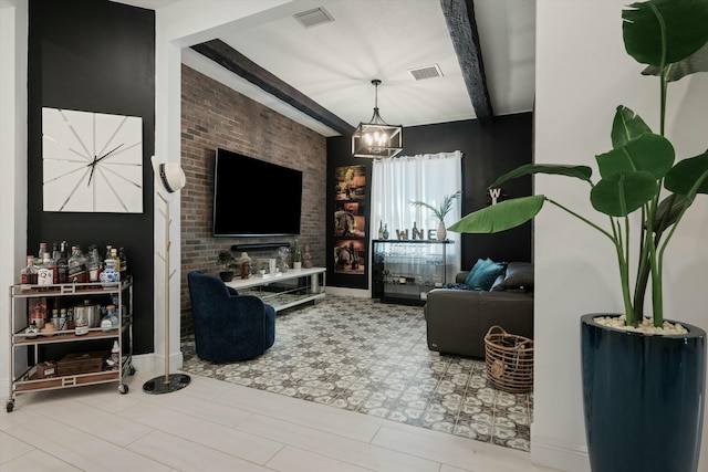 living area featuring an inviting chandelier, visible vents, and beam ceiling