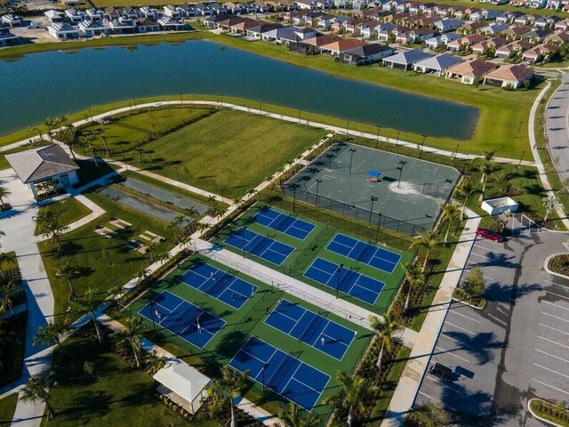 aerial view with a water view and a residential view