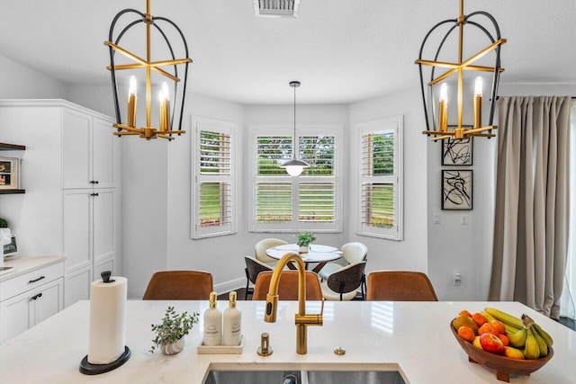 dining space featuring baseboards, arched walkways, wood finished floors, and stairway